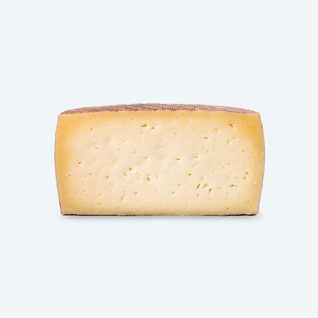 Queso de Leche Cruda De Oveja Añejo Gran Reserva Mitad | Quesos COVAP