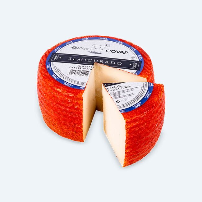 Queso de Leche Pasteurizada de Cabra Semicurado Entero con cuña cortada | Quesos COVAP